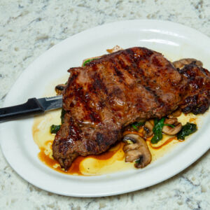 Grilled steak with mushrooms